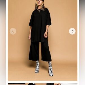 Dressed in Lala Lex Ribbed Playsuit in black - Large